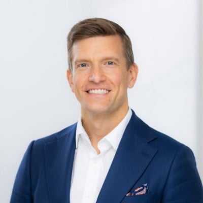 headshot of man smiling 